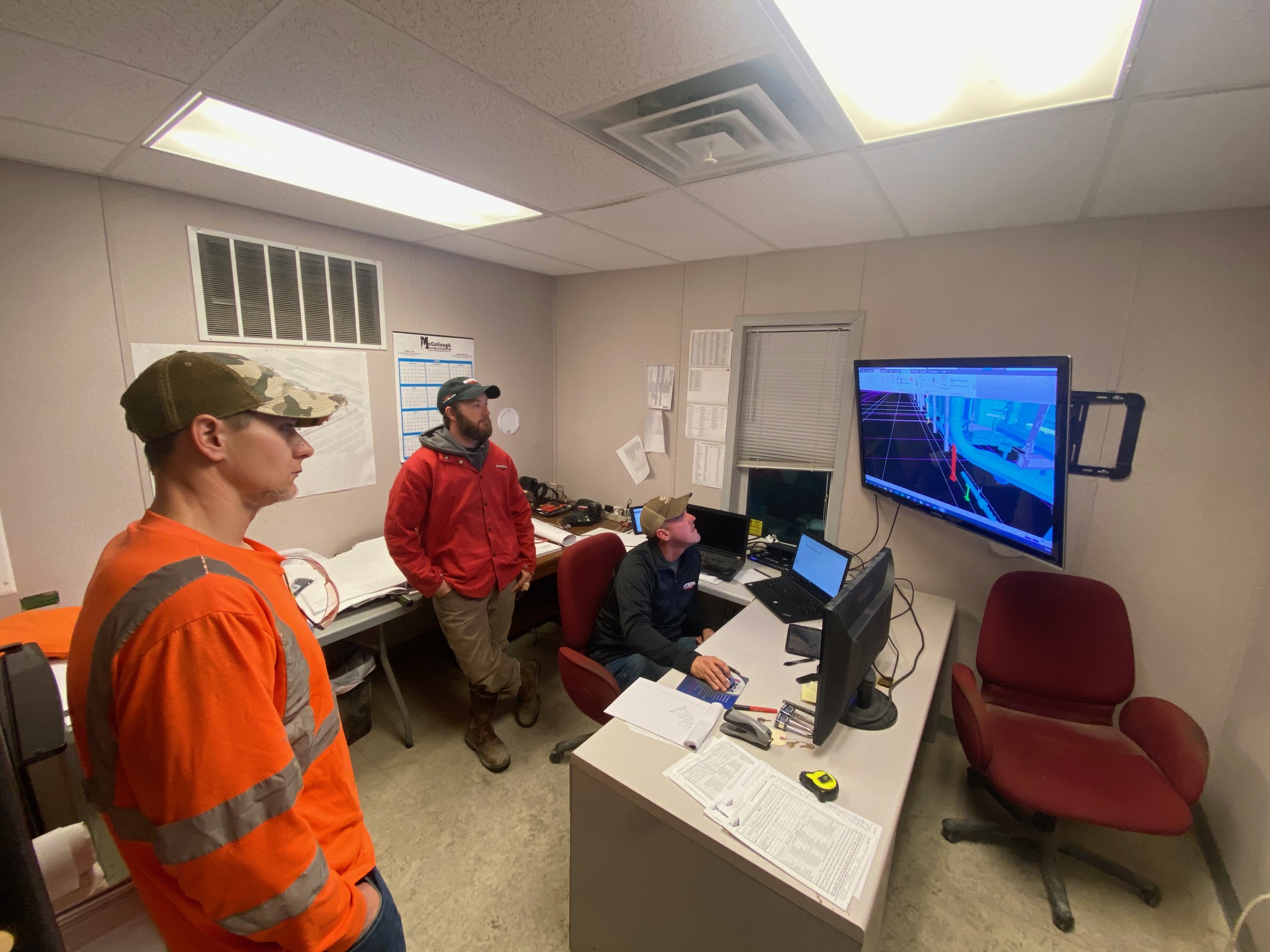 The process piping engineering team at work, using 3D modeling software